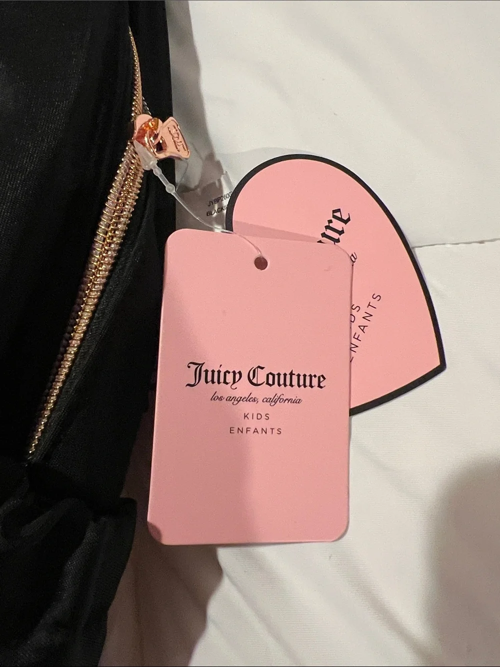 Juicy Couture Black Quilted Backpack with Rose Gold Heart Charm Accents kids 6+